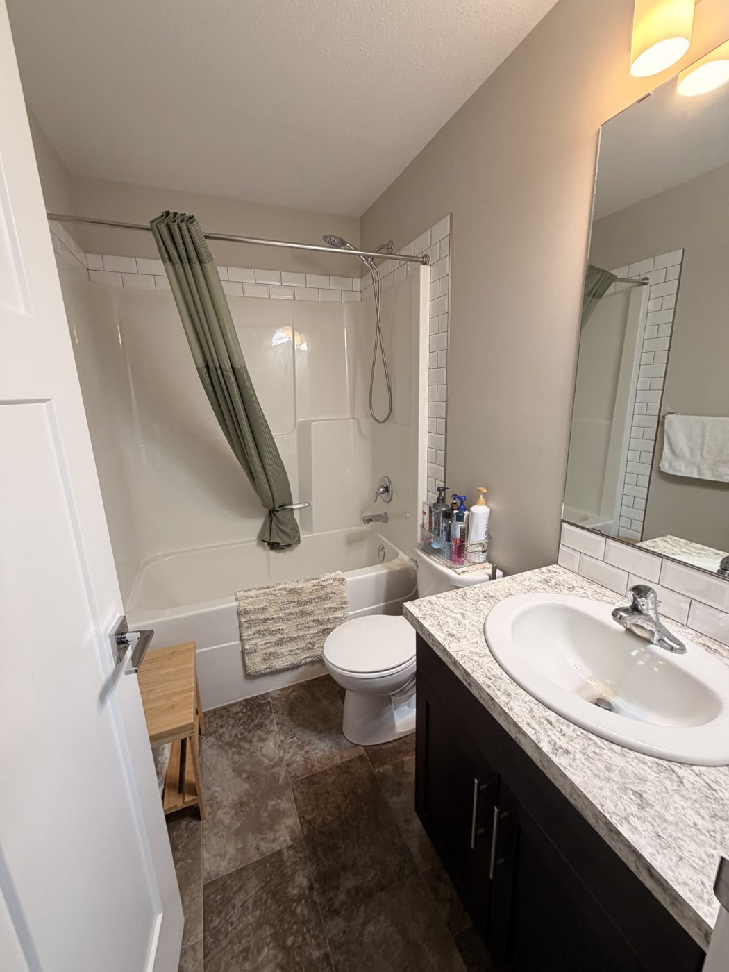 Sparkling clean bathroom with tub and vanity